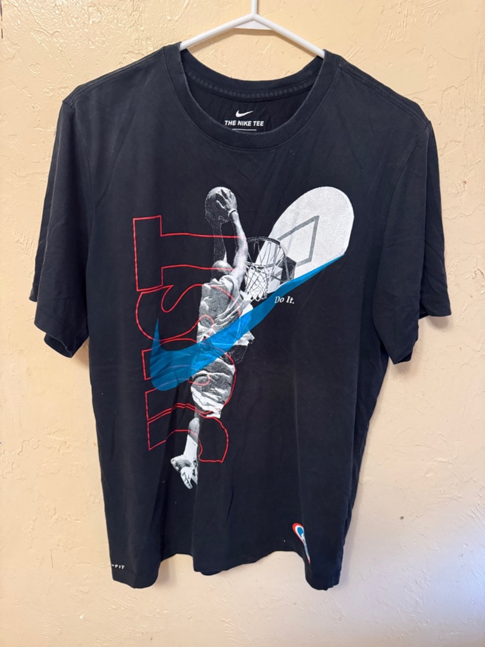 Nike Black Short-Sleeve Basketball Graphic Tee with Blue Swoosh